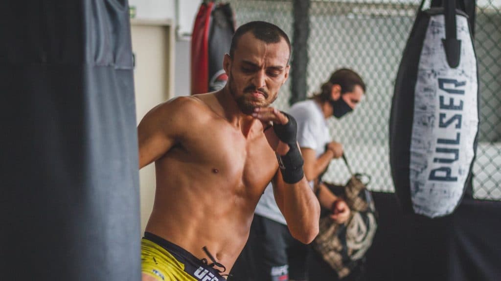 Topless Man in Yellow Shorts