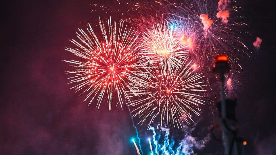 selective focus photography of fireworks display at night